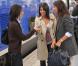 Géraldine Nakache et Leïla Bekhti posent avec une fan, à la Gare de Lyon. 26 août 2010