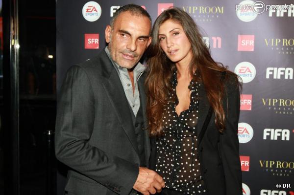 Christian Audigier et sa nouvelle compagne Isha, à la soirée FIFA au VIP Room à Paris, le 11 octobre