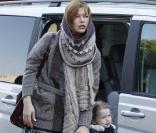 Milla Jovovich entourée de sa petite Ever et de son époux Paul W. S. Anderson à Berlin. Octobre 2010