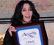 Cher laisse ses empreintes au Grauman's Chinese Theatre, à Hollywood, le 18 novembre 2010