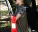 Paris Hilton sort de son hôtel de Los Angeles, samedi 27 novembre. Elle est suivie par son actuel petit ami, Cy Waits.