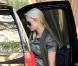 Paris Hilton sort de son hôtel de Los Angeles, samedi 27 novembre. Elle est suivie par son actuel petit ami, Cy Waits.