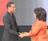 Oprah Winfrey lors de l'enregistrement de son émission en Australie le 13/12/10. Ici, avec Jay-Z 