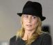Robin Wright et son fils Hopper à l'aéroport de Los Angeles. Janvier 2011