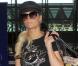 Paris Hilton et son compagnon Cy Waits à Los Angeles, le 26 janvier 2011.