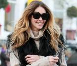 Elle Macpherson ne quitte plus son sac Jimmy Choo Rosabel en léopard<br />