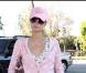 Paris Hilton porte sa couleur préféré le rose de la tête aux pieds, février 2007.