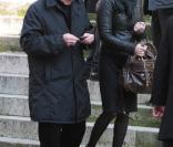 Claude Lelouch et Evelyne Bouix quittant l'église Saint-Roch à Paris où se sont déroulées les obsèques d'Annie Girardot le 4 mars 2011