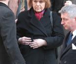 MArie-Laure Augry quittant l'église Saint-Roch à Paris où se sont déroulées les obsèques d'Annie Girardot le 4 mars 2011