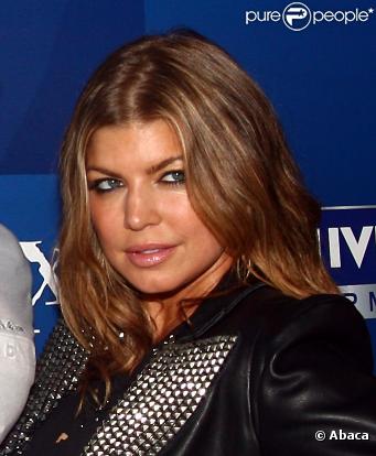 Fergie et DN Donamatrix, à la fête du coach sportif, au Chin Chin à Los Angeles, le 10 mars 2011