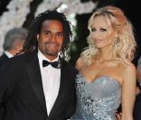 Adriana et Christian Karembeu, aujourd'hui séparés, à Monte Carlo, le 30 juillet 2010. 