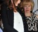 Carla-Bruni Sarkozy dévoile son ventre rond à l'issue d'une réunion organisée en marge du sommet du G8, à Deauville, le 26 mai 2011.