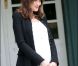 Carla-Bruni Sarkozy dévoile son ventre rond à l'issue d'une réunion  organisée en marge du sommet du G8, à Deauville, le 26 mai 2011.