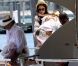 Katie Holmes profite de sa fille Suri Cruise durant la Fête des Pères aux côtés de son mari Tom Cruise à bord de leur bateau le Little Castle le 19 juin 2011