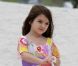Suri Cruise sur une plage de Miami le 18 juin 2011
