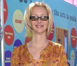 Lisa Kudrow, son fils Julian et son époux Michel en 2003. 