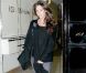 Même si elle esquisse un sourire (très rare pour la star), Victoria Beckham mélange les styles pour un effet des plus brouillon ! Londres, 6 décembre 2004
