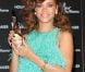  Rihanna en pleine promotion de son parfum Reb'l Fleur, à Londres, le 19 août 2011 