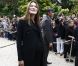 Lors de sa dernière sortie en public, Carla Bruni-Sarkozy affichait clairement un ventre très arrondi dans une robe noire. Paris, 23 septembre 2011 