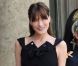 Depuis 2008, Carla Bruni porte le nom du président de la République. Madame  Sarkozy est devenue l'ambassadrice du chic à la française grâce à ses élégantes tenues de grand couturier. Paris, 13 juillet 2010
