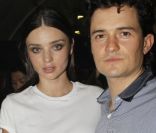 Miranda Kerr et Orlando Bloom lors du défilé Lanvin à Paris le 30 septembre 2011 pour les collections prêt-à-porter Printemps/été 2012
