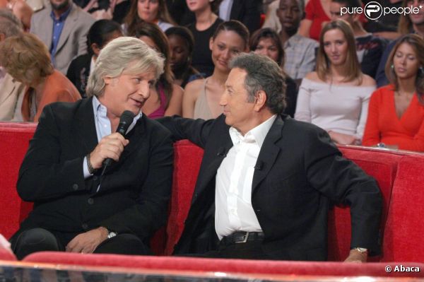 Patrick Sébastien et Michel Drucker, dans  Vivement dimanche , en septembre 2004.