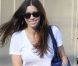 Jessic Biel affiche un large sourire à Los Angeles; La star est fière de son style et de son sac Tod's ! Le 12 octobre 2011 