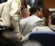 Le docteur Conrad Murray lors de l'énoncé de son verdict le 7 novembre 2011. Il a été menotté puis conduit en prison