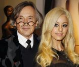 Zahia Dehar et Pierre Passebon lors de la présentation des photos du livre de Christian Louboutin à la galerie du Passage à Paris le 21 novembre 2011