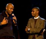 Harry Roselmack et Claudy Siar lors du Noël pour Tous à la Palmeraie de Paris où 400 enfants ont reçu leurs cadeaux des mains du Père Noël le 7 décembre 2011