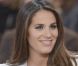 Elisa Tovati, enceinte et souriante, sur le plateau de Vivement Dimanche spécial La vérité si je mens ! 3, diffusé le 15 janvier 2012