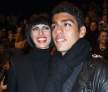 Karolina Kurkova et Noah Becker assistent au défilé Guido Maria Kretschmer lors de la Fashion Week de Berlin, le 19 janvier 2012.