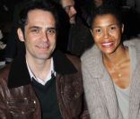 La chanteuse Ayo et l'acteur Rasha Bukvic au premier rang du défilé Kris Van Assche à Paris, le 20 janvier 2012.
