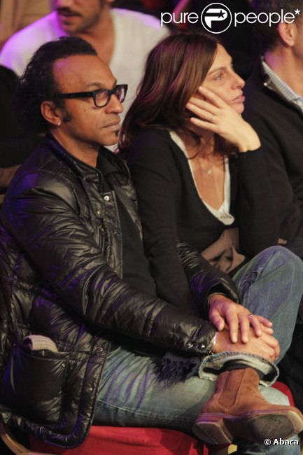 Manu Katché et sa femme le 1er février à la salle Wagram pour la rencontre de boxe entre le Paris United et les Dragons de Pékin dans le cadre des Worlds Séries of Boxing à Paris