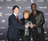 Marthe Mercadier et Lilian Thuram aux Globes de Cristal, au Lido, le 6 février 2012.