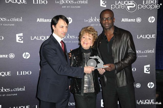 Marthe Mercadier et Lilian Thuram aux Globes de Cristal, au Lido, le 6 février 2012.