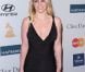 Britney Spears pose sur le tapis rouge, lors de la soirée des Pre-Grammy, le samedi 11 février 2012 à Los Angeles.