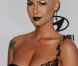 Amber Rose pose sur le tapis rouge, lors de la soirée des Pre-Grammy, le samedi 11 février 2012 à Los Angeles.