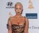 Amber Rose pose sur le tapis rouge, lors de la soirée des Pre-Grammy, le samedi 11 février 2012 à Los Angeles.