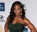 Serena Williams pose sur le tapis rouge, lors de la soirée des Pre-Grammy, le samedi 11 février 2012 à Los Angeles.