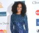 Kelly Rowland pose sur le tapis rouge, lors de la soirée des Pre-Grammy, le samedi 11 février 2012 à Los Angeles.