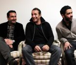 Gilles Lellouche, Jean Dujardin et Manu Payet devant la presse à Lille pour défendre le film à sketches Les Infidèles le 13 février 2012