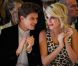 Pixie Lott et son petit ami Oliver Cheshire, amoureux complices pour applaudir la collection automne-hiver 2012 de Temperley London. Londres, le 18 février 2012.