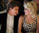 Pixie Lott et son petit ami Oliver Cheshire, amoureux complices pour applaudir la collection automne-hiver 2012 de Temperley London. Londres, le 18 février 2012.