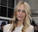 Poppy Delevingne se rend au défilé House Of Holland à Londres, le 18 février 2012.