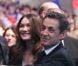Carla Bruni-Sarkozy et Nicolas Sarkozy fendent la foule réunie au Parc Chanot à Marseille, le 19 février 2012.