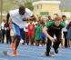 Le prince Harry, vif comme l'Eclair en Jamaïque, laisse Usain Bolt sur place
