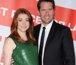 Alyson Hannigan enceinte, aux côtés de son mari Alexis Denisof, à l'avant-première d' American Pie 4  à Los Angeles, le 19 mars 2012.
