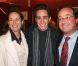 Thomas entre ses parents François Hollande et Ségolène Royal à Paris, le 11 janvier 2005.