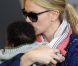 Pour la première fois, Charlize Theron présente son fils Jackson, à l'aéroport de Paris Roissy, le 8 mai 2012